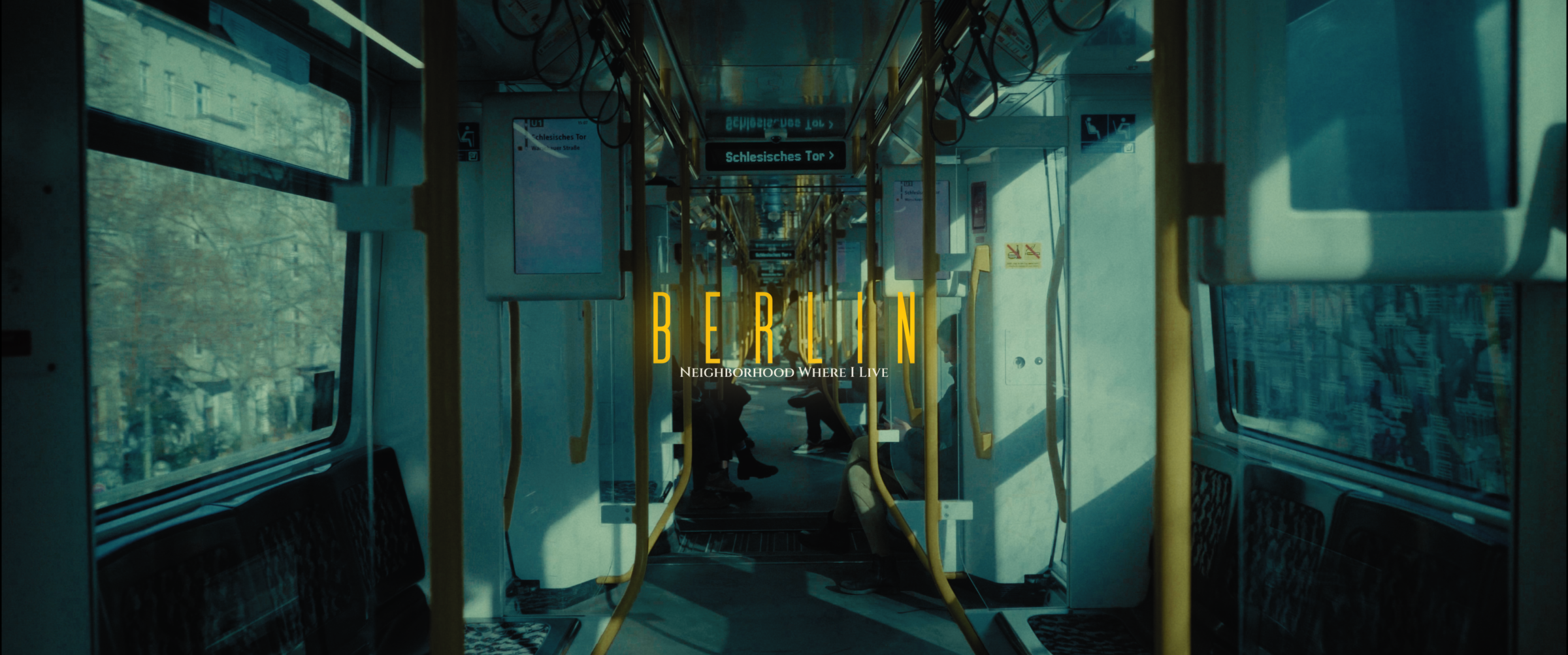U-Bahn train interior with ‘Berlin, Neighborhood Where I Live’ title text