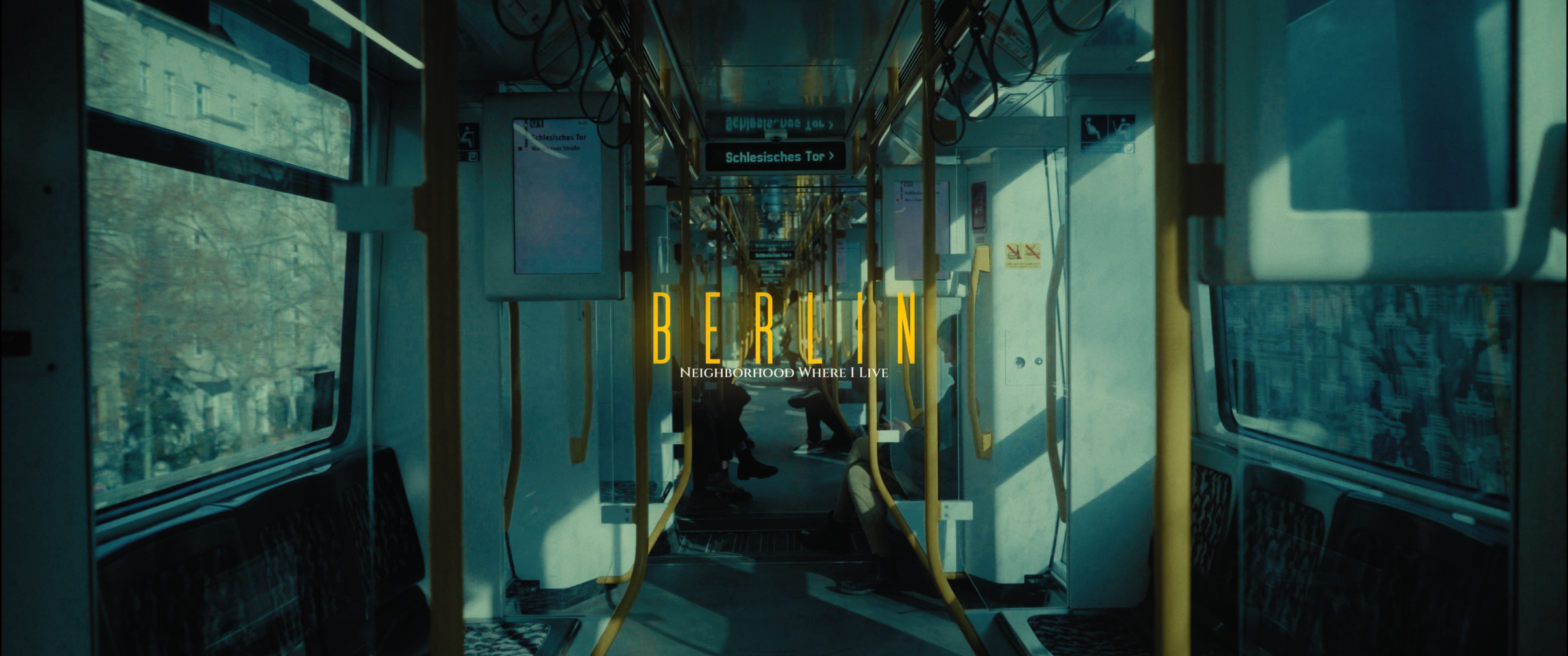 U-Bahn train interior with ‘Berlin, Neighborhood Where I Live’ title text